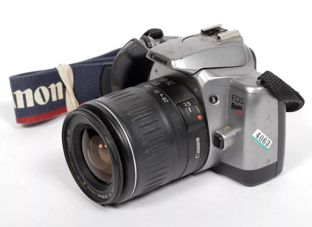 Canon Eos Rebel k2 store 35mm Film Camera Comes with Canon 28-90mm lens and flash